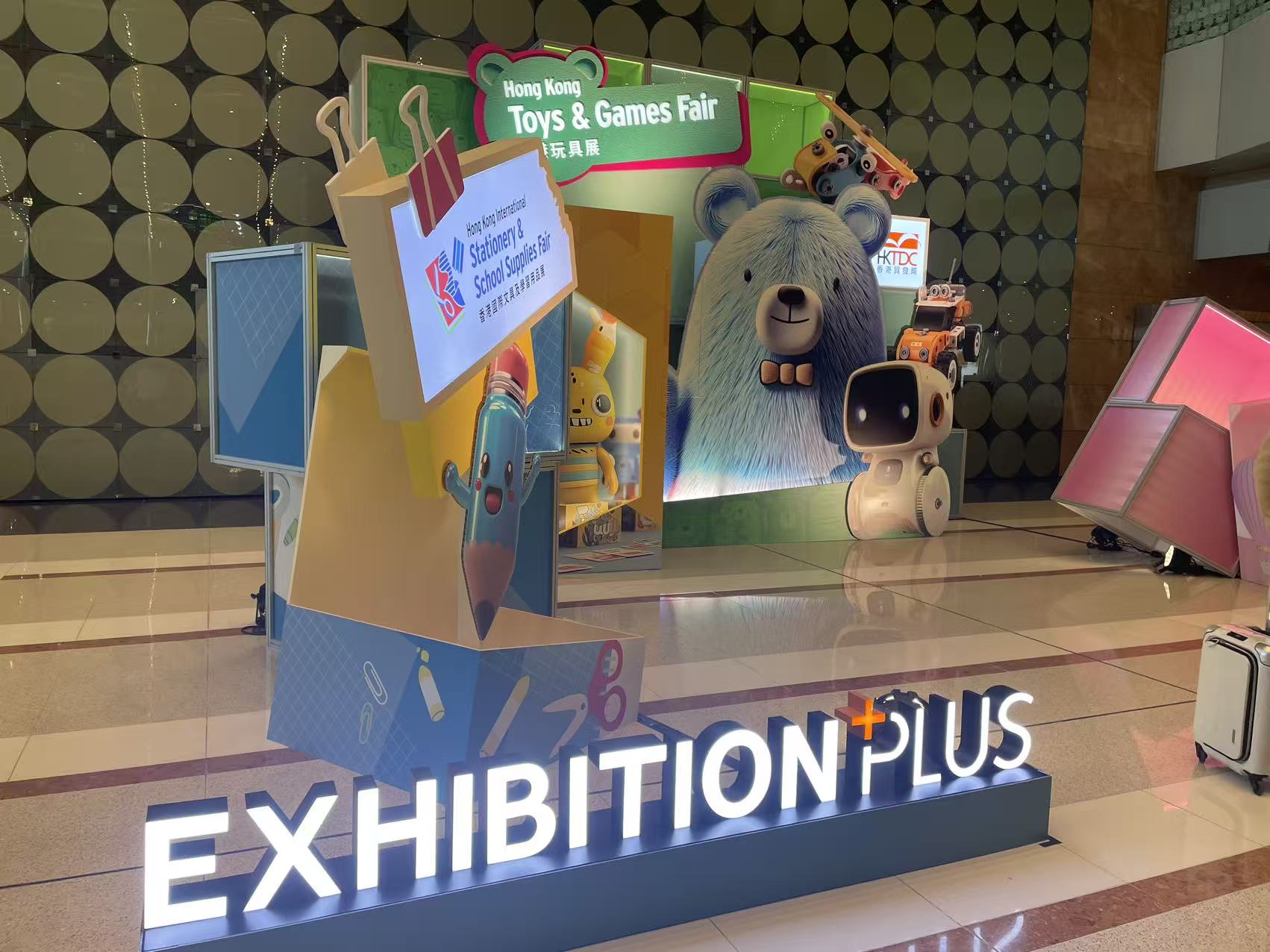 Hong Kong Toys & Games Fair exhibition display with a bear and robot